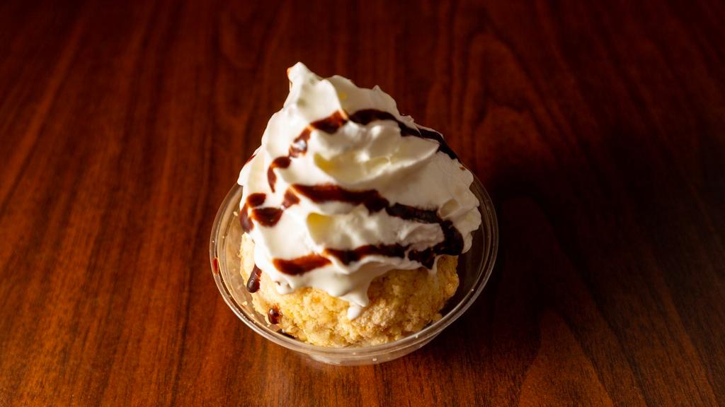 Ice-Cream Bomb · This dessert is similar like fried ice-cream without the extra oil. A scoop of homemade vanilla ice-cream cover with a layer of soft cake, crunchy cereal and top with whipped cream and chocolate sauce.