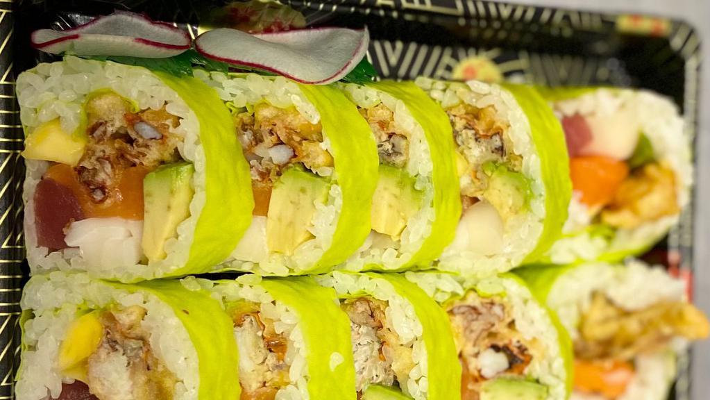 Godzilla Roll · Soft shell crab tuna, salmon,yellowtail, white tuna, mango,avocado wrapped with soy paper in miso glazed
