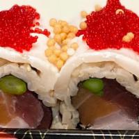 Foxy Lady Roll · Tuna, salmon,yellowtail, asparagus inside seared white tuna on the top with red tobiko, scal...