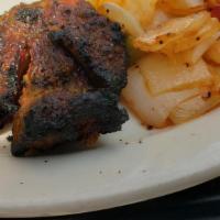 Duck Kebab · Gluten-free. Duck breasts marinated with yogurt, an array of masterfully blended spices and ...