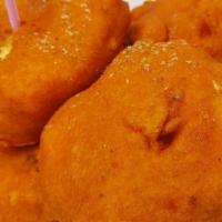Cheese Pakora · Gluten-free. Stuffed homemade slice of cheese dipped in chickpea batter and crisp fried.