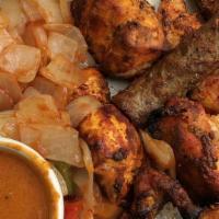 Chicken Tikka · Gluten-free. Tendered chicken marinated with yogurt and barbecued in Tandoori oven.