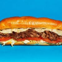 Cheesesteak Hoagie · Sliced steak with melted provolone, grilled onions, lettuce, tomato, and mayo on a hoagie ro...