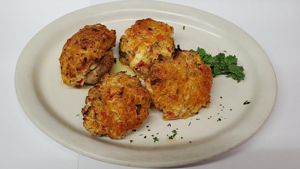 Stuffed Mushrooms · Jumbo mushrooms stuffed with crabmeat stuffing, touch of butter and sherry wine.