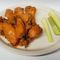 Buffalo Wings · With hot sauce, celery, carrots and Bleu cheese dressing.