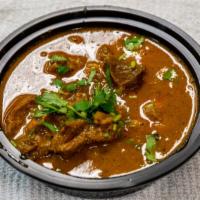 Bengan Bhurta And Rice · Vegetarian. Bengan bhurta and rice (16oz): eggplant cooked in an old-fashioned Indian style ...