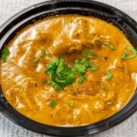 Butter Chicken And Rice · Butter chicken and rice (16oz): chicken cooked in an exquisite creamy mild tomato sauce.