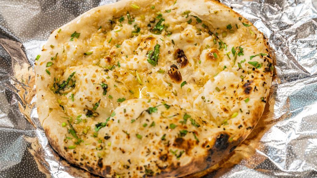 Garlic Naan · Garlic naan: white flour bread with garlic.
