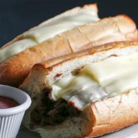 Cheese Steak Sandwich · 10oz. of your choice of beef or chicken steak topped with melted American cheese on a 12