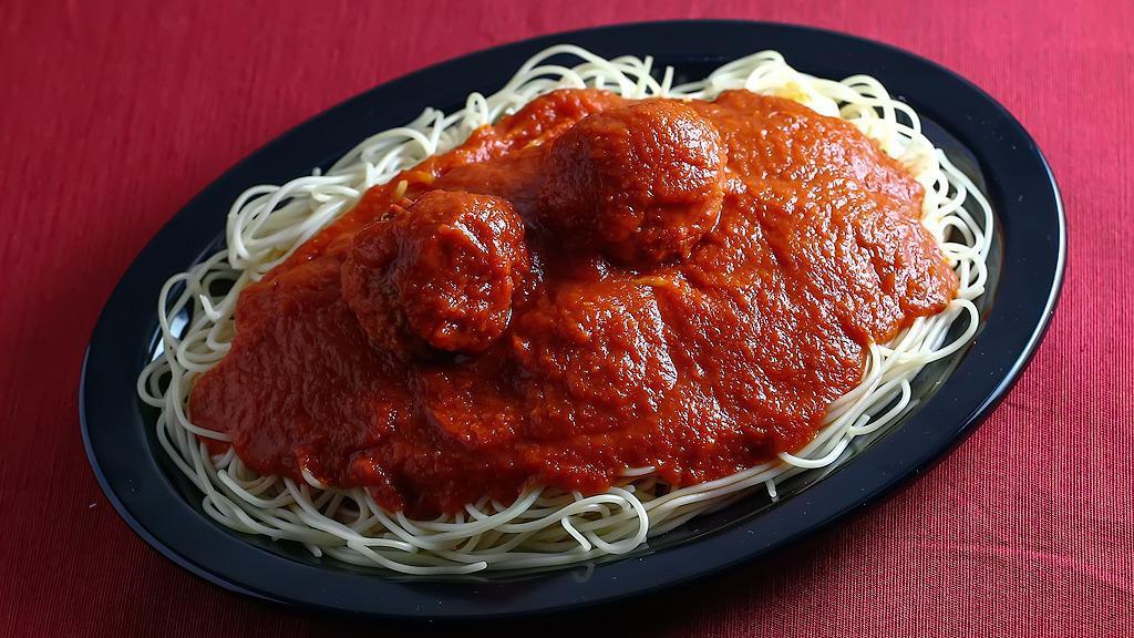 Spaghetti · Spaghetti  topped  with our homemade tomato sauce. Served with a side salad and our homemade garlic sticks