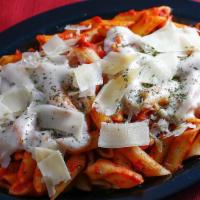 Baked Penne · Topped and baked with tomato sauce, Romano and mozzarella cheese.