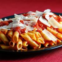 Penne · Penne topped  with our homemade tomato sauce. Served with a side salad and our homemade garl...