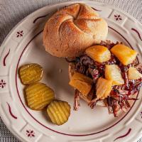 Hawaiian Brisket Bbq Sandwich · Smoked brisket served on a kaiser roll with grilled pineapples and BBQ steak sauce.