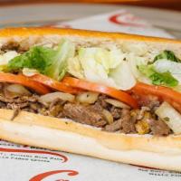 Cheesesteak Hoagie · Rib-eye steak with melted cheese and sauteed onions served on a long roll with fresh lettuce...