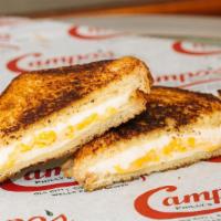 Grilled Cheese · Cooper sharp, American and cheddar cheeses on thick buttery brioche.