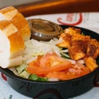 Side Salad · Fresh Romaine, tomatoes, onions, and croutons. Served with Italian bread and our house made ...