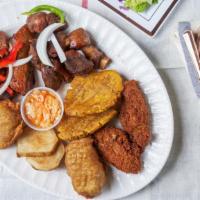 Griot-Pork · serve with rice/beans or white rice with beans sauce.