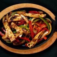 Chicken Fajita · Served with rice, beans, salad and corn tortillas.