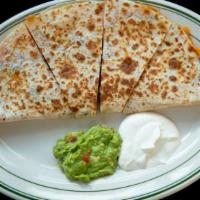 Chicken Quesadilla · Filled with: cheese, beans and pico de gallo. Served with guacamole and sour cream.
