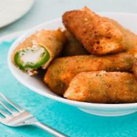 Fried Jalapeno Poppers · Fried jalapeno poppers, stuffed with cream cheese.