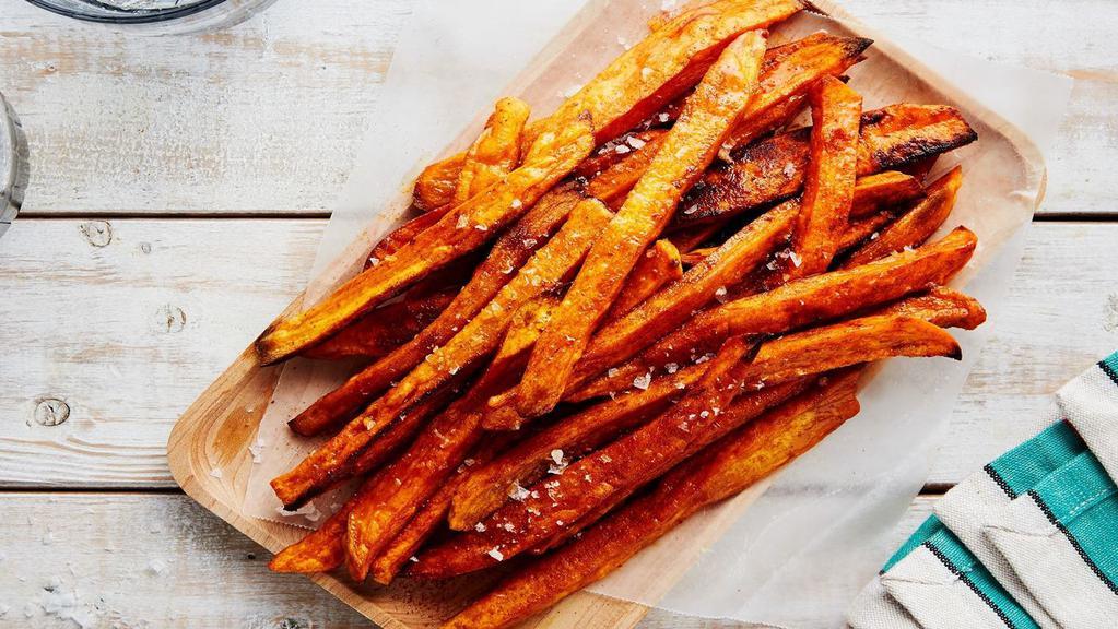 Sweet Potato Fries · Fried sweet potato fries.