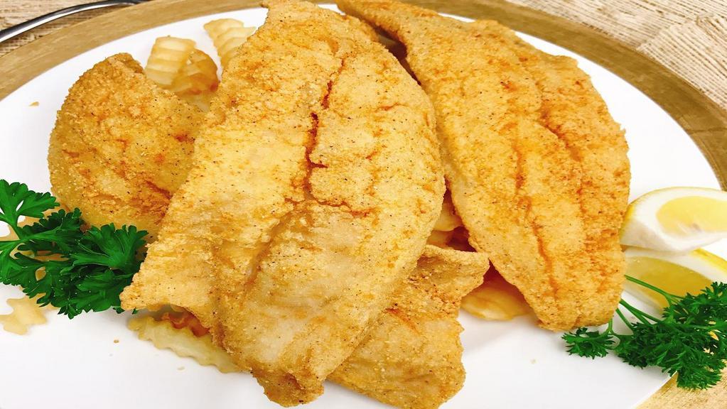 Fried Whiting (3) · Crispy fried whiting fillet, served with choice of two side dishes and choice of bread.