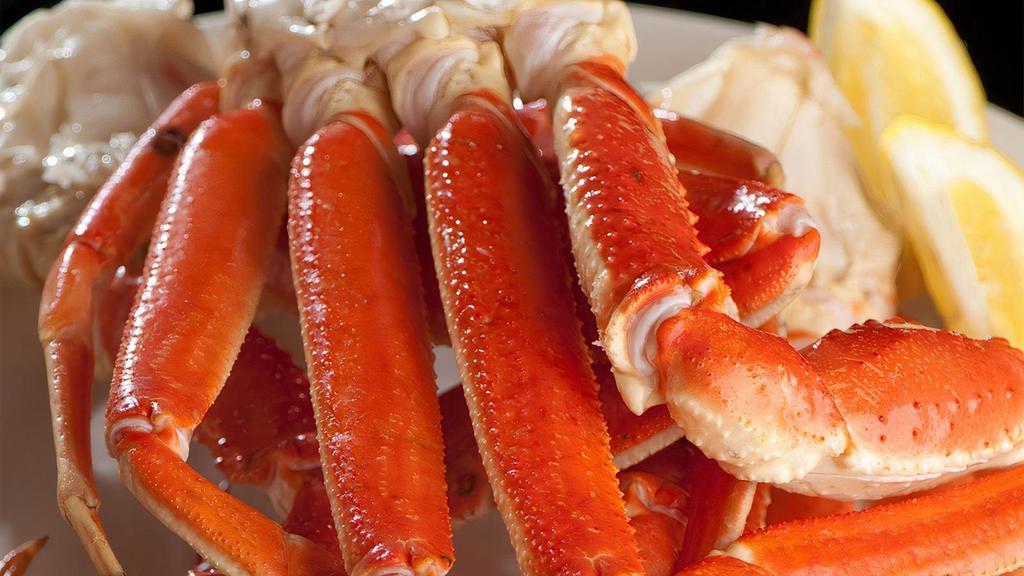 2 Lb Steamed Crab Legs · Steamed snow crab leg clusters, served with melted butter, choice of two side dishes and choice of bread.