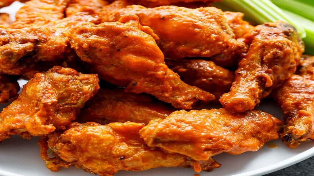 Signature Chicken Wingettes (10) · Fried chicken wingettes, tossed in your choice of sauce, served with two side dishes and choice of bread.