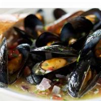 Mussels. (1 Lb ) · Garlic and herbs in white wine sauce.