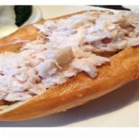 Jumbo Crab Meat Roll W/ Choice Of A  Side · 6 oz. jumbo lump crab meat with no filler of  hot crab meat in a split bun with melted lemon...