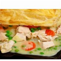  Chicken Pot Pie W/ One Side · Mixed with our rotisserie chicken ,carrots,peas ,Idaho potato and our homemade delicious sauce