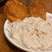 Kettle Fried Chips & Dip · with sour cream and smoked onion dip.