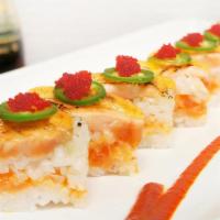 Aburi Oshi-Salmon · Torched salmon, tempura bits, creamy sriracha, jalapeño, tobiko.