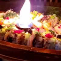 The Black Pearl · Our signature sushi boat for 2 guests.  Assorted torched nigiris (8 pcs.) and sashimis (12 p...