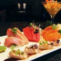 Sashimi Omakase · Chef’s choice of assorted sashimi arts, sushi rice and salad.