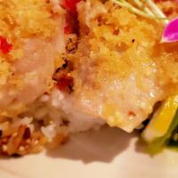 Garlic Baked Snapper · tempura flakes, seaweed salad, sushi rice, kabayaki, furikake