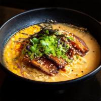 Miso Ramen · imported fresh ramen noodles, sweet butter corn, scallions, nori, onsen egg, chili bean past...