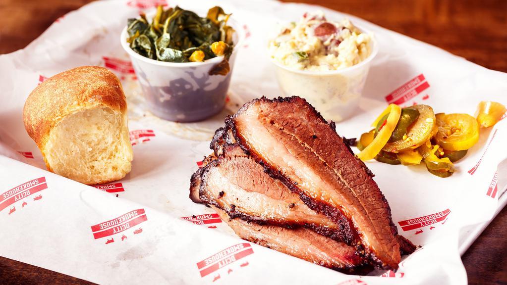 Smokehouse Meat Platter · 1/2 lb choice of brisket, turkey, or pulled pork, two small sides.
