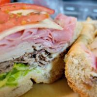 Pudge Hoagie* · Roast beef turkey ham and american cheese. come with lettuce tomato onion and oregano.