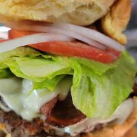 Bacon Cheeseburger* · Comes standard with lettuce, tomato and raw onions.
