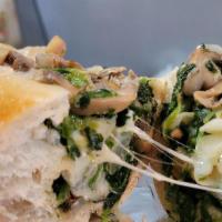 Spinach Sub* · Comes with sauteed spinach, mushrooms, fried onions and provolone cheese.
