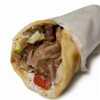 Ny Style Lamb Gyro Wrap · Roasted well marinated lamb with lettuce, tomato, onion and a drizzle of our fresh homemade ...