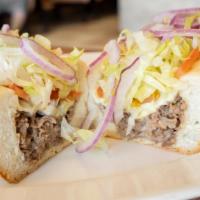 Cheese Steak Hoagie Sandwich · Includes lettuce, tomato, onions and cheese.