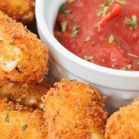 Mozzarella Sticks · 10 piece of nice mozzarella stickers cooking nice golden and brown served with homemade mari...