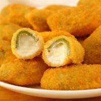Jalapeño Poppers · 10 pieces delicious fried jalapeños poppers cooking nice golden and brown served with homema...