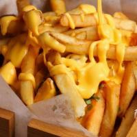 Cheese Fries 🍟 · Delicious crispy fries melted with yellow cheddar and mozzarella cheese 
Served with homemad...