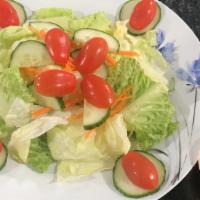 Green Salad · Large Size
Lettuce,Cucumber,Carrot,Tomato and Spring Mix With Ginger Dressing.