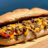 Cheesesteak · Chopped Angus on a fresh Long Roll, American Cheese, with or without, served with a side of ...