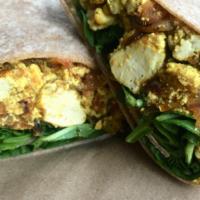 Curry Tofu Scramble Wrap · Curry seasoned tofu, onion and tomato sautéed together with spinach in your choice of wrap.