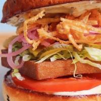 Smoked Tofu Sandwich · Marinated and smoked tofu served on our house sesame seed bun with fried onion strings and a...